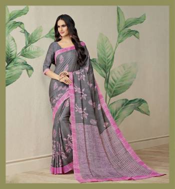 Rich And Elegant Looking Saree Is Here In Grey Color Paired With Grey Colored Blouse. This Saree Is Fabricated On Jute Art Silk Paired With Art Silk Fabricated Blouse. It Has Pretty Simple Prints All Over The Saree In Grey And Contrasting Pink Color.