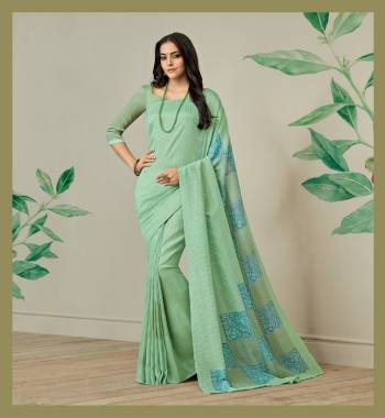 This Season Is About Subtle Shades And Pastel Play, So Grab This Saree In Pastel Green Color Paired With Pastel Green Colored Blouse. This Saree Is Fabricted On Jute Art Silk Paired With Art Silk Fabricated Blouse. It Has Prints Over The Saree Lace Border. Buy Now.