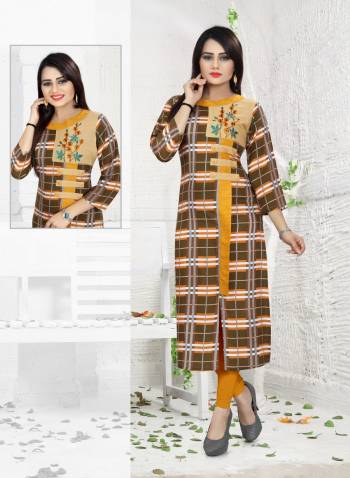 Add This Pretty Kurti To Your Wardrobe In Shades Of Brown Fabricated On Rayon. This Pretty Kurti Is Fabricated On Rayon Which Is Soft Towards Skin And Easy To Carry Throughout The Day.