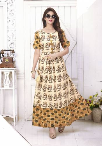 Grab Ths Pretty Kurti In Cream And Brown Color Fabricated On Cotton. This Readymade Kurti Is Light In Weight And Ensures Superb Comfort All Day Long.