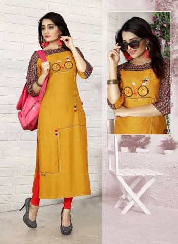 Look Attractive Wearing This Designer Readymade Kurti In Musturd Yellow Color Fabricated On Rayon Beautified With Prints And Thread Work. It Is Soft Towards Skin And Ensures Superb Comfort All Day Long.