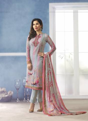 Flaunt Your Rich And Elegant Taste Wearing This Semi-Stitched Suit In Grey Color Paired With Grey Colored Bottom And Dupatta. Its Top Is Fabricated On Georgette Paired With Santoon Bottom And Chiffon Dupatta. Its All Three Fabrics Ensures Superb Comfort All Day Long. Buy Now.