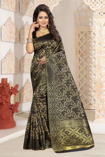 For A Bold And Beautiful Look, Grab This Silk Saree In Black Color Paired With Black Colored Blouse. This Saree And Blouse Are Fabricated On Kanjivaram Art Silk Beautified With Weave. Buy Now.