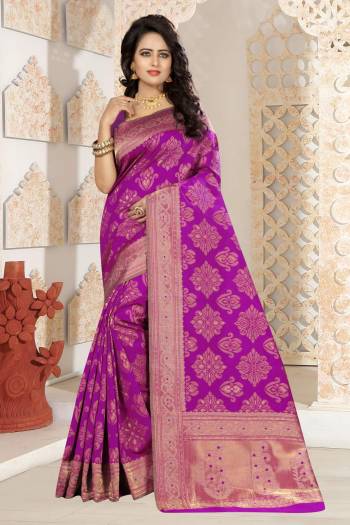 Here Is A Pretty Attractive Silk Saree In Magenta Pink Color Paired With Mangenta Pink Colored Blouse. This Saree And Blouse Are Fabricated On Kanjivaram Art Silk Beautified With Weave All Over. Buy Now.