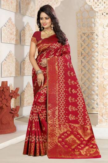 Adorn The Angelic Look wearing this Saree In Red Color Paired With Red Colored Blouse. This Saree And Blouse are Fabricated On Kanjivaram Art Silk Beautified With Weave All Over It. It Is Durable and Easy To Care For.