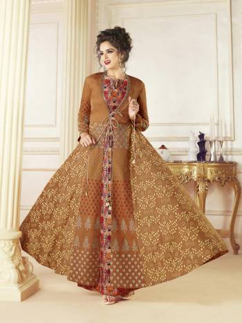 Grab This Designer Readymade Gown In Light Brown Color Fabricated On Cotton Blend. Its Fabric Is Soft Towards Skin And Easy To Carry Throughout The Gala. Buy This Indo-Western Gown Now.