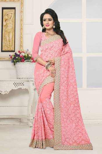 Look Pretty In This Beautiful Designer Heavy Saree In Light Pink Color Paired With Light Pink Colored Blouse. This Saree And Blouse Are Fabricated On Georgette Beautified With Heavy Embroidery With Pearl And Stone Work. Buy Now.