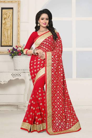 Adorn The Lovely Angelic Look Wearing this Heavy Designer Saree In Red Color Paired With Red Colored Blouse. This Saree And Blouse Are Fabricated On Georgette Beautified With Heavy Jari Embroidery And Stone Work.