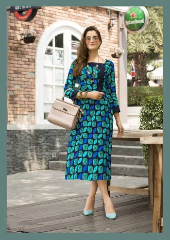 For Your Casual Or Semi-Casual Wear, Grab This Lovely Readymade Kurti In Navy Blue And Sea Green Color Fabricated On Cotton Satin Beautified With Prints All Over. This Pretty Kurti Is Light Weight And Ensures Superb Comfort All Day Long.