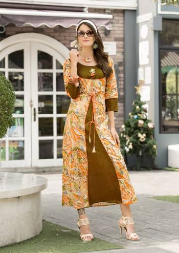 You Will Earn Lots Of Compliments Wearing This Designer Readymade Kurti In Olive Green And Orange Color Fabricated On Cotton Satin Beautified With Prints All Over It. This Kurti Is Light Weight And easy To carry All Day Long.