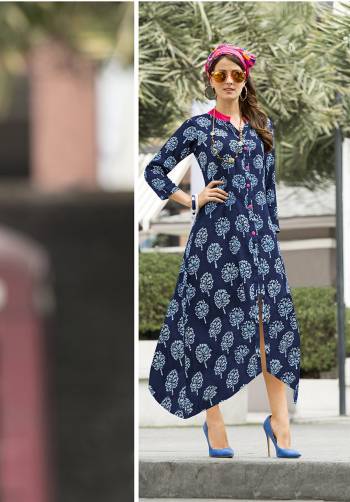 Grab This Pretty Readymade Kurti In Blue Color Fabricated On Cotton Satin Beautified with Prints all Over It. It Has Pretty High Low Pattern At The Hem. Buy It Now.