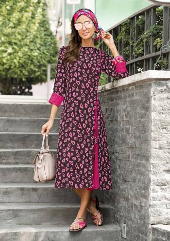 Look Pretty Wearing this Lovely Kurti In Brown And Pink Color Fabricated On Cotton Satin Beautified With Pink Colored Prints all Over It. This Readymade Kurti Is Available In Many Sizes. Buy It Now.