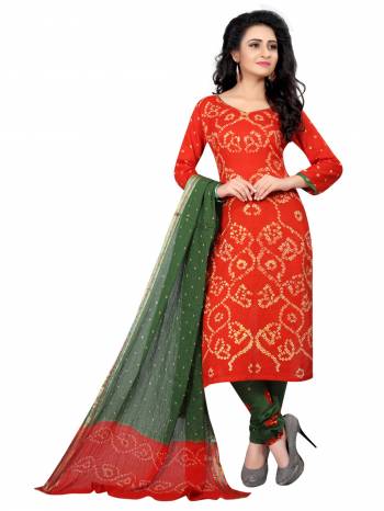 Beat The Heat This summer With Bright Shades And Soft Fabrics In Casuals. Grab This Dress Material In Orange Colored Top Paired With Contrasting Green Colored Bottom And Dupatta. It Is Fabricated On Satin Cotton, Get This Stitched as Per Your Desired Fit And Comfort. Buy Now.