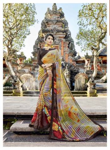 Go Colorful With This Saree In Multi Color Paired With Brown Colored Blouse. This Saree Is Fabricated On Georgette Paired with Art Silk Fabricated Blouse. It Is Beautified With Floral And Polka Dots Prints All Over.