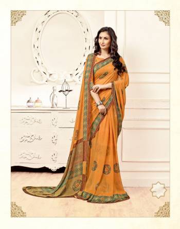 Grab This Pretty Attractive Saree In Yellow Color Paired With Yellow Colored Blouse. This Saree And Blouse are fabricated On Georgette Beautified With Prints All Over It. It Is Light Weight And Ensures Superb Comfort All Day Long.