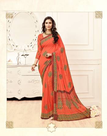 Beat The Heat In Bright With This Attractive Saree In Orange Color Paired With Orange Colored Blouse. This Saree And Blouse are fabricated On Georgette Beautified With Prints All Over. Buy Now.