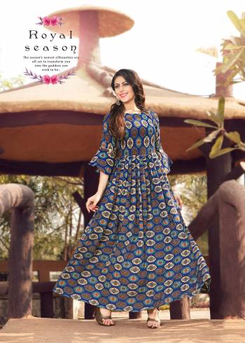 For Your Semi-Casual Wear Of Formal Wear, Grab this Beautiful Designer Readymade Kurti In Blue Color Fabricated On Rayon Cotton Beautified With Same Prints All Over It. Its Fabric Is Soft Towards Skin And Ensures Superb Comfort All Day Long.