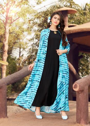 Add This Pretty Kurti To Your Wardrobe In Black And Blue Color Fabricated On Rayon Cotton. This Readymade Kurti Is Available Is All Sizes And Ensures Superb Comfort All Day Long. Buy Now.