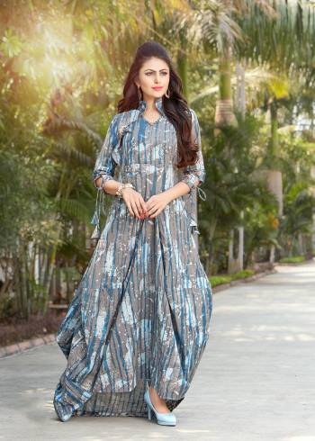 Simple And Elegant Looking Designer Readymade Kurti Is Here In Grey Color Fabricated On Rayon Cotton. It Is Beautified With Abstract Prints All Over The Kurti. Buy Now.