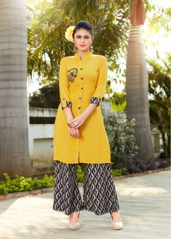 You Will Definitely Earn Lots Of Compliments Wearing This Designer Readymade Pair Of Kurti In Yellow Color Paired With Black And Whiite Colored Plazzo. This Kurti And Plazzo Are Fabricated On Rayon Beautified With Prints. Its Lovely Color And Pattern Will Earn You Lots Of Compliments From Onlookers. 