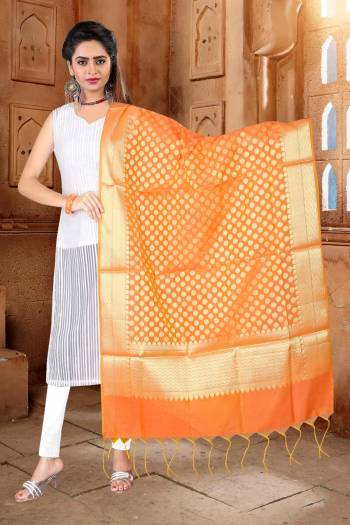 Bright And Visually Appealing Color Is Here With This Dupatta In Orange Color Fabricated On Banarasi Art Silk Beautified With Weave. Pair This Up With Contrasting Color Kurti. 