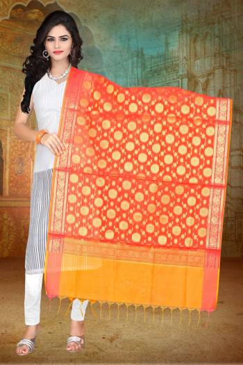 Shine Bright With This Beautiful And Attractive Dupatta In Orange Color Fabricated On Banarasi Art Silk Beautified With Weave. This Can Be Paired With Any Contrasting Colored Kurti Or Suit. Buy Now.