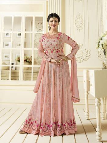 Look Pretty Wearing This Beautiful Designer Floor Length Suit In Baby Pink Color Paired With Baby Pink Colored Bottom And Dupatta. Its Top Is Fabricated On Georgette Paired With Santoon Bottom And Chiffon Dupatta, Also Its Has Very Pretty Floral Printed Satin Fabricated Inner. Buy This Semi-Stitched Suit Now.