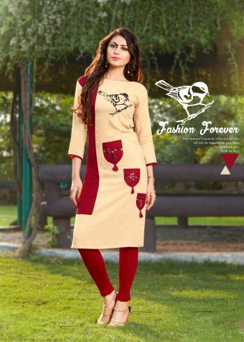 Grab This Pretty Readymade Kurti In Beige And Maroon Color Fabricated On Rayon. It Is Beautified With Simple Prints And Can Be Paired With Maroon Colored Leggings. Buy This Readymade Kurti Now.