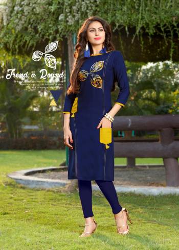 Look Attractive In This Lovely Readymade Kurti In Blue Color Fabricated On Rayon. This Pretty Kurti Is Beautified With Prints And Also It Is Light In Weight And easy To Carry all day Long.