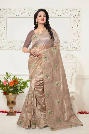 Simple And Elegant Looking Pretty Designer Saree Is Here In Light Beige Color Paired With Light Beige Colored Blouse. This Saree Is Fabricated On Oragenza Paired With Art Silk Fabricated Blouse. Buy This Pretty Saree Now.