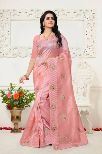 Look Pretty Wearing This Lovely Designer Saree In Light Pink Color Paired With Light Pink Colored Blouse. This Saree Is Fabricated On Orgenza Paired With Art Silk Fabricated Blouse. It Is Beautified With Contrasting Embroidery Making The Saree Attractive.