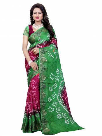 Grab This Saree In Green And Magenta Pink Color Paired With Magenta Pink Colored Blouse.This Saree And Blouse are Fabricated On Art Silk Beautified With Prints All Over It. Buy This Saree Now.