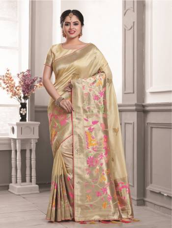 Simple, Rich And Elegant Looking Saree Is Here In Cream Color Paired With Cream Colored Blouse. This Saree And Blouse Are Fabricated On Art Silk Beautified With Weaving And Stone Work. Buy This Simple Saree Now.