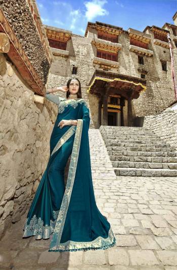 You Will Definitely Earn Lots Of Compliments For The Color With This Designer Saree In Blue Color Paired With Blue Colored Blouse. This Saree Is Fabricated On Satin Silk Paired With Art Silk Fabricated Blouse. Pair This Up With Jewellery For An Enhanced Look.