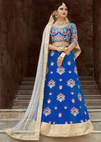 Posh and alluring, this faroese art silk kalidaar style lehenga is highlighted with resham and pearl embroidery. It comes along with an embroidered sweetheart neck butta work blouse. Styled up with off white embroidered dupatta.
