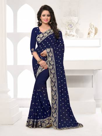 Featuring An Eye Catching design with This Beautiful Designer Saree In Navy Blue Color Paired With Navy Blue Colored Blouse. This Saree And Blouse are Fabricated On Georgette Beautified With Attractive Embroidery. This Pretty Design Is Available In Many Colors.