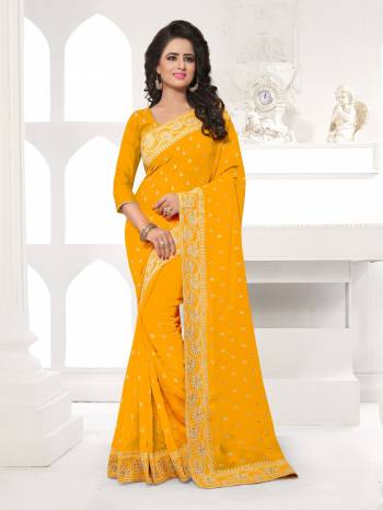 Featuring An Eye Catching design with This Beautiful Designer Saree In Orange Color Paired With Orange Colored Blouse. This Saree And Blouse are Fabricated On Georgette Beautified With Attractive Embroidery. This Pretty Design Is Available In Many Colors.