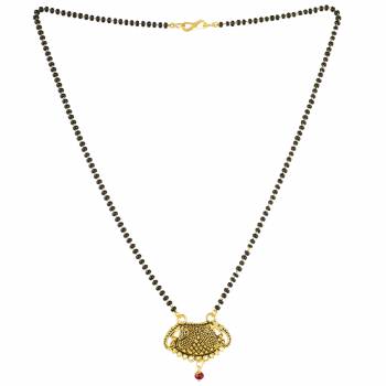 Grab This Pretty Simple Mangalsutra For Your Daily Wear In Golden Color With A Small Hanging Stone. This Mangalsutra Can Be Paired With Any Attire. Buy Now.