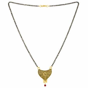 Grab This Pretty Simple Mangalsutra For Your Daily Wear In Golden Color With A Small Hanging Stone. This Mangalsutra Can Be Paired With Any Attire. Buy Now.