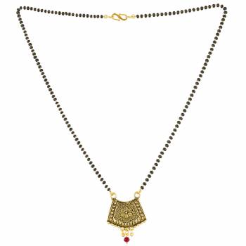 Grab This Pretty Simple Mangalsutra For Your Daily Wear In Golden Color With A Small Hanging Stone. This Mangalsutra Can Be Paired With Any Attire. Buy Now.