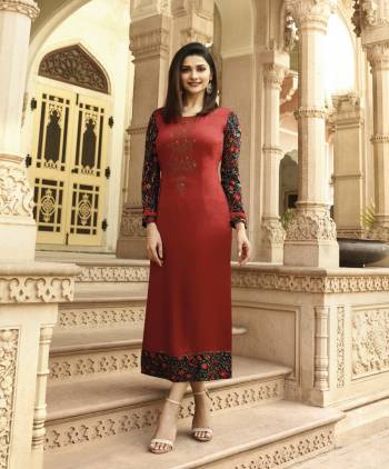 Adorn The Pretty Angelic Look Wearing This Readymade Designer Kurti In Black Color Fabricated On Satin. This Kurti Is Beautified With Prints And Stone Work Making The Saree Attractive. 