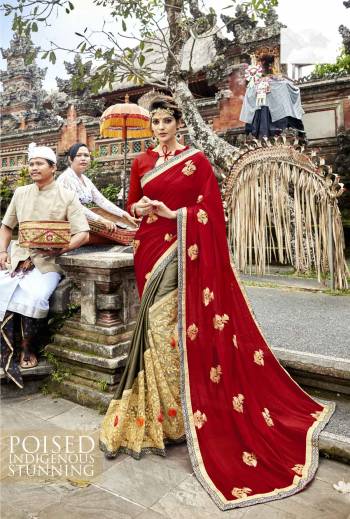 Adorn The Angelic Look Wearing This Designer Saree In Red And Cream Color Paired With Red Colored Blouse. This Saree Is Fabricated On Georgette And Art Silk Paired With Art Silk Fabricated Blouse. It Is Beautified With Heavy Embroidery All Over.