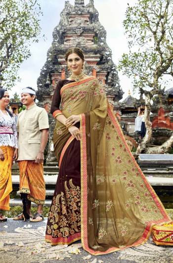 Flaunt Your Rich And Elegant Taste Wearing This Designer Saree In Light Brown And Brown Color Paired With Brown Colored Blouse. This Saree IS fabricated On Silk Georgette And Georgette Paired With Art Silk Fabricated Blouse. It Has Heavy Attractive Embroidery All Over The Saree.