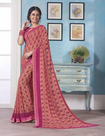 A Must Have Shade In Every Women Wardrobe Is Here With This Peach Colored Saree Paired With Contrasting Pink Colored Blouse. This Saree And Blouse Are Fabricated On Georgette Beautified With Small Floral Prints All Over It.