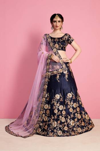 Enhance Your Personality In This Heavy Designer Lehenga Choli In Navy Blue Color Paired With Contrasting Light Pink Colored Dupatta. This Lehenga Choli Is Fabricated On Velvet Silk Paired With Net Fabricated Dupatta. It Has Heavy Embroidery Which Is Making This Lehenga Choli Attractive.