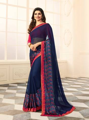 Enhance Your Personality Wearing This Simple Saree In Navy Blue Color Paired With Contrasting Dark Pink Colored Blouse. This Saree Is Fabricated On Georgette Paired With Art Silk Fabricated Blouse. It Is Light Weight And Easy To Carry All Day Long.