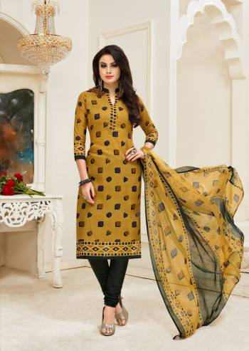 A Perfect Suit For Your Casual Wear Is Here With This Dress Material In Musturd Colored Top Paired With Black Colored Bottom And Musturd And Black Dupatta. Its Top And Bottom Are Fabricated On Cotton Paired With Chiffon Dupatta . Buy Now.