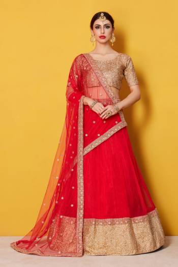 Featuring a scoop neck sequinned glitter blouse and a solid color net lehenga with a matching red shantoon interlining. The lehenga has a 9