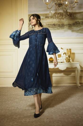 Enhance Your Beauty Wearing This Designer Readymade Kurti In Blue Color With Blue Colored Printed Inner. Its Kurti Is Fabricated On Georgette Paired With Soft Silk Floral Printed Inner. It Is Available In All Sizes.