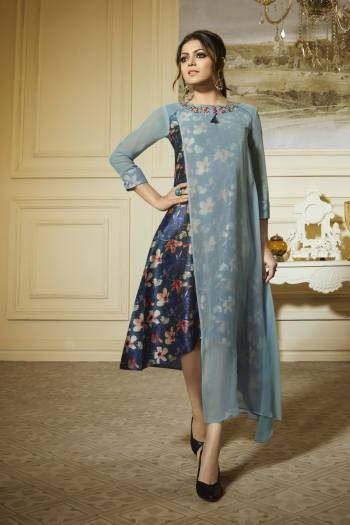 Go With The Shades Of Blue With This Lovely Designer Readymade Kurti In Pastel Blue Color With Navy Blue Colored Printed Inner. It Is Fabricated On Georgette With Soft Silk Fabricated Inner. Both Its Fabric Are Light Weight And Easy To Carry All Day Long.